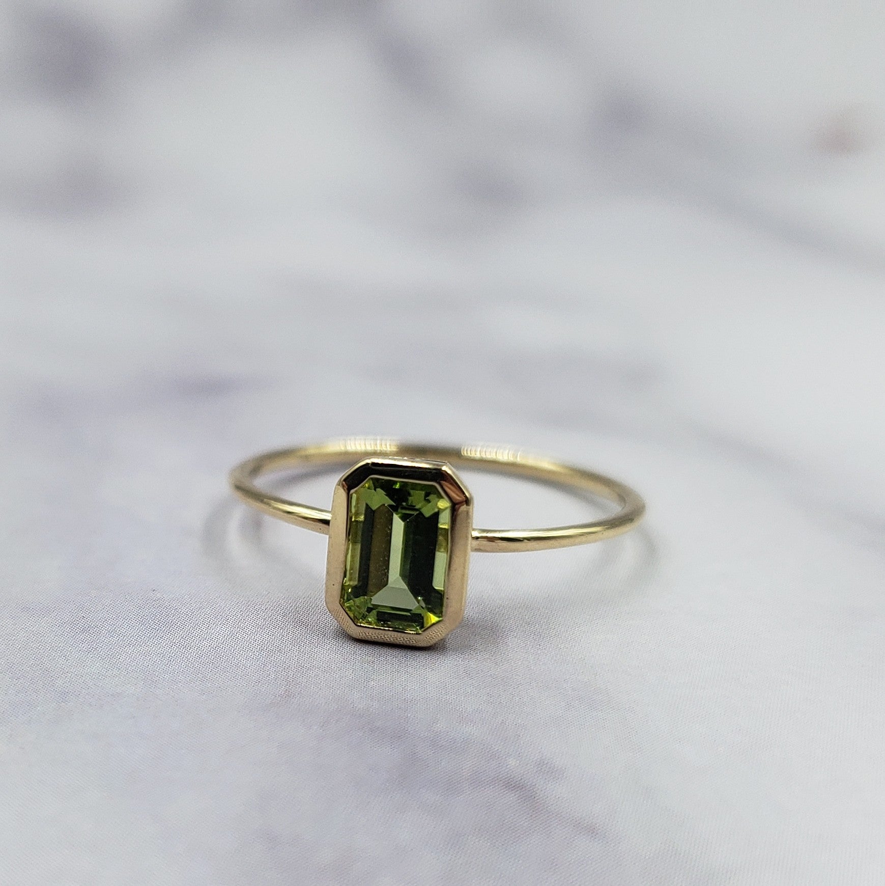 14k Emerald Cut Peridot Ring